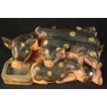 An early 20th century large Oriental carved and painted figure of a mother pig and her piglets. H.35