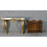 A 19th century Italian parcel gilt and silvered console table, wall mounted but missing the marble