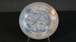 A Ming dynasty hand painted porcelain Zhangzhou Swatow plate with phoenix design. (restored) H.7.5