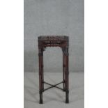 A late Victorian Chippendale style mahogany jardiniere stand, the square top with a pierced