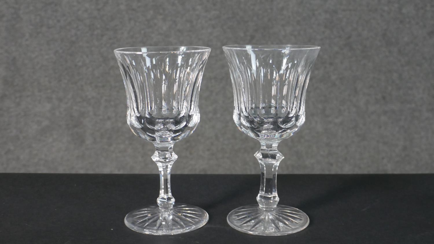 A collection of seven hand cut Waterford crystal wine and sherry glasses with star cut bases. - Image 4 of 6