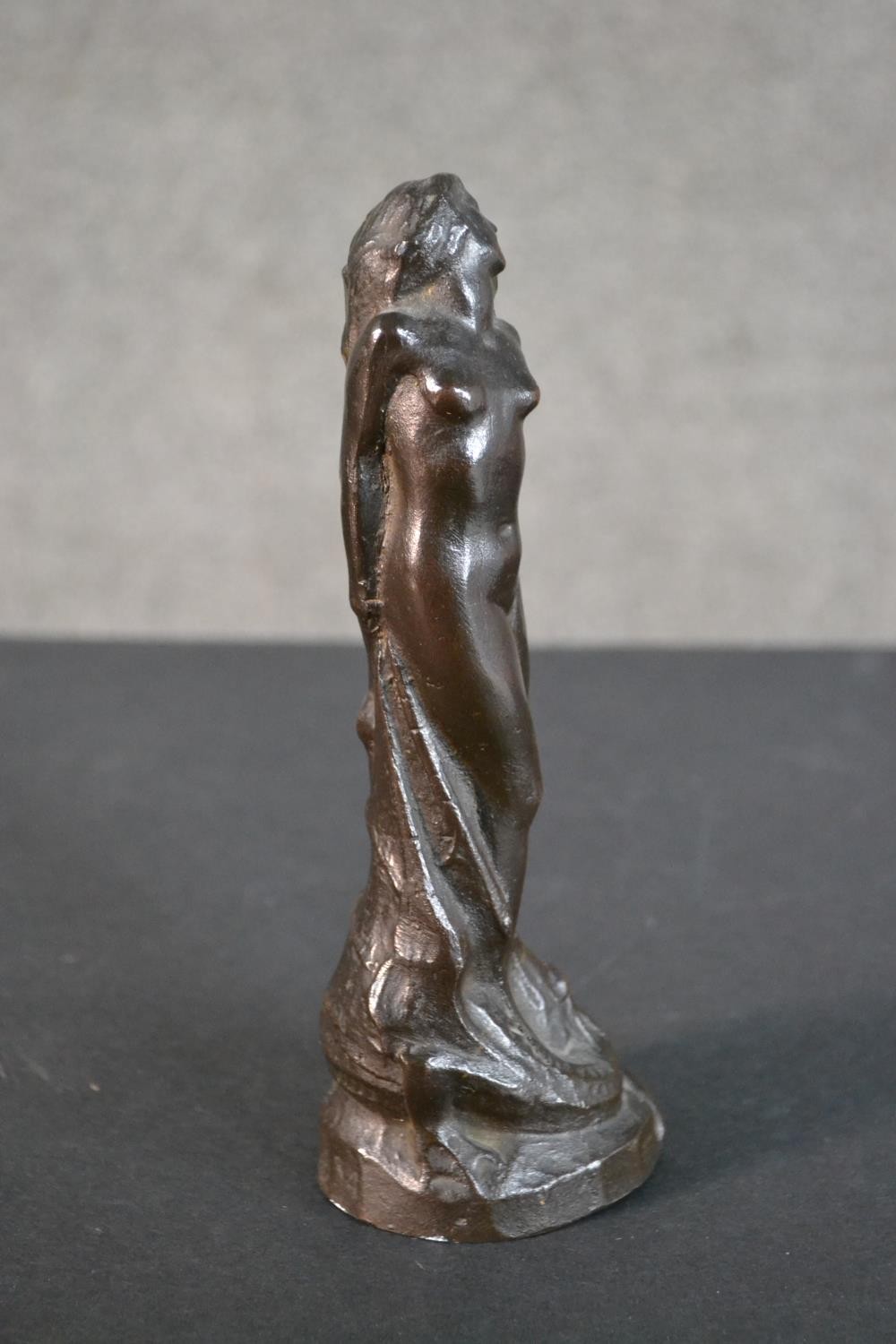 A 20th century bronze figurine of a nude woman tied at a stake with dragon at her feet. Dated - Image 3 of 8