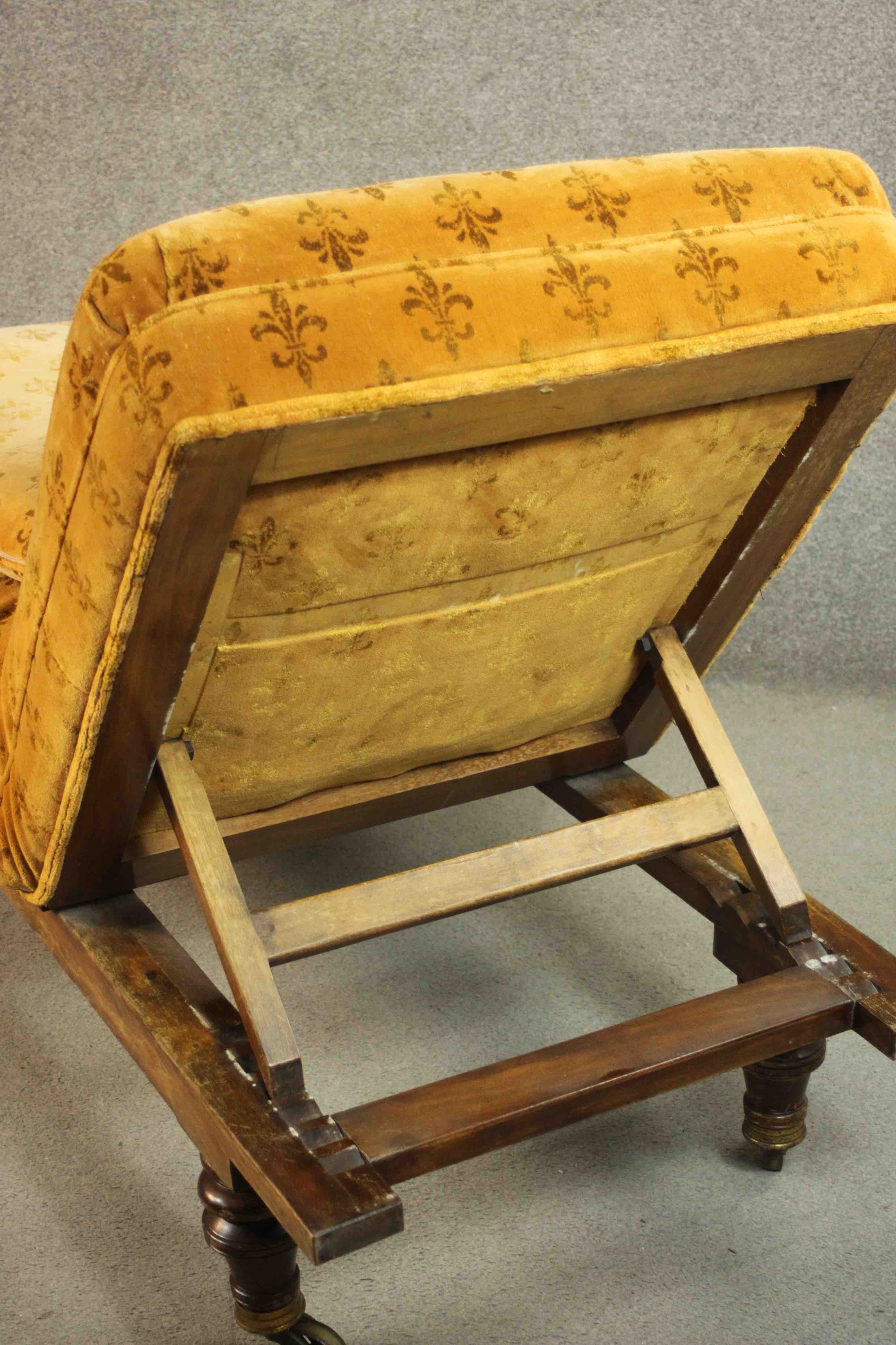 A Victorian daybed or doctor's examining bed, upholstered in a patterned mustard fabric with a loose - Image 11 of 11