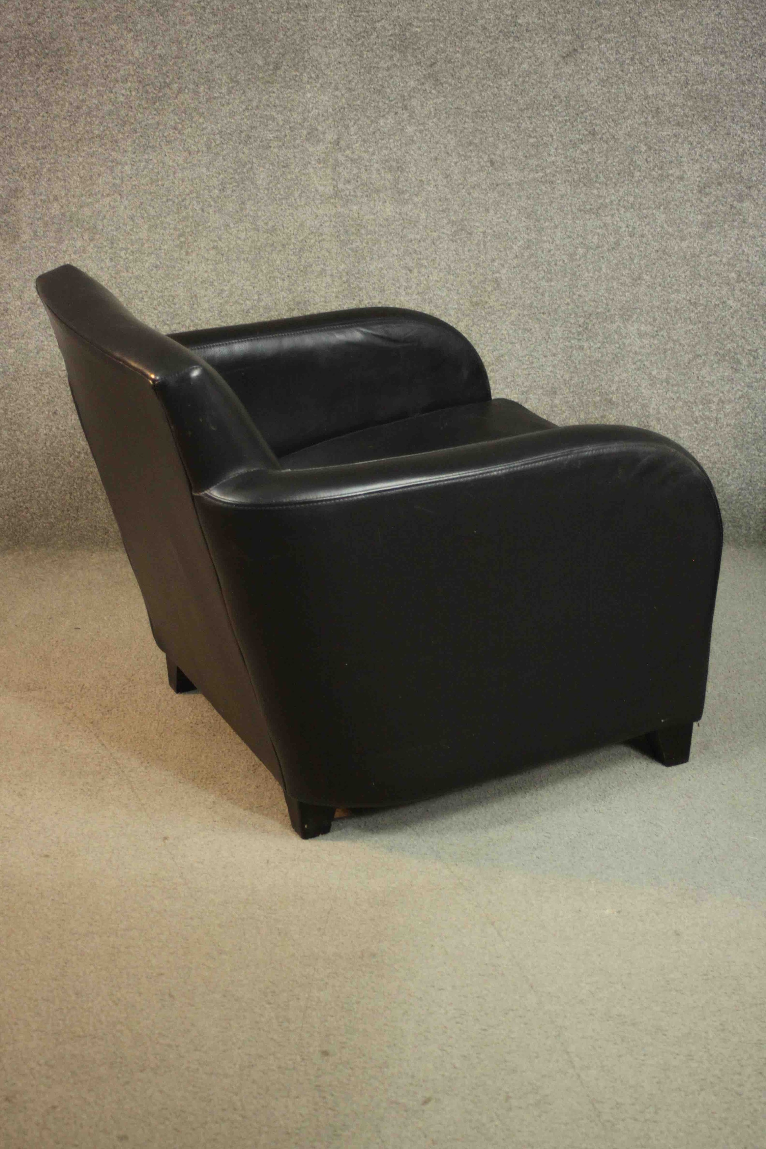 A pair of contemporary black leather armchairs, on tapering block feet. - Image 4 of 8