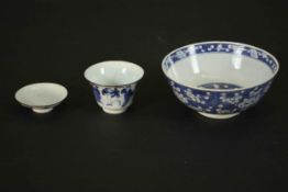 A collection of Chinese 19th century blue and white porcelain. A prunus blossom design bowl with