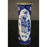A 19th century Chinese blue and white cylindrical vase with flared rim. Decorated with ''precious