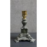 A classical column design brass table lamp with lion head motifs. H.25 W.19cm