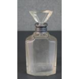 An Art Deco silver collared crystal decanter with fan shaped stopper. (chipped) Hallmarked: WB&S for