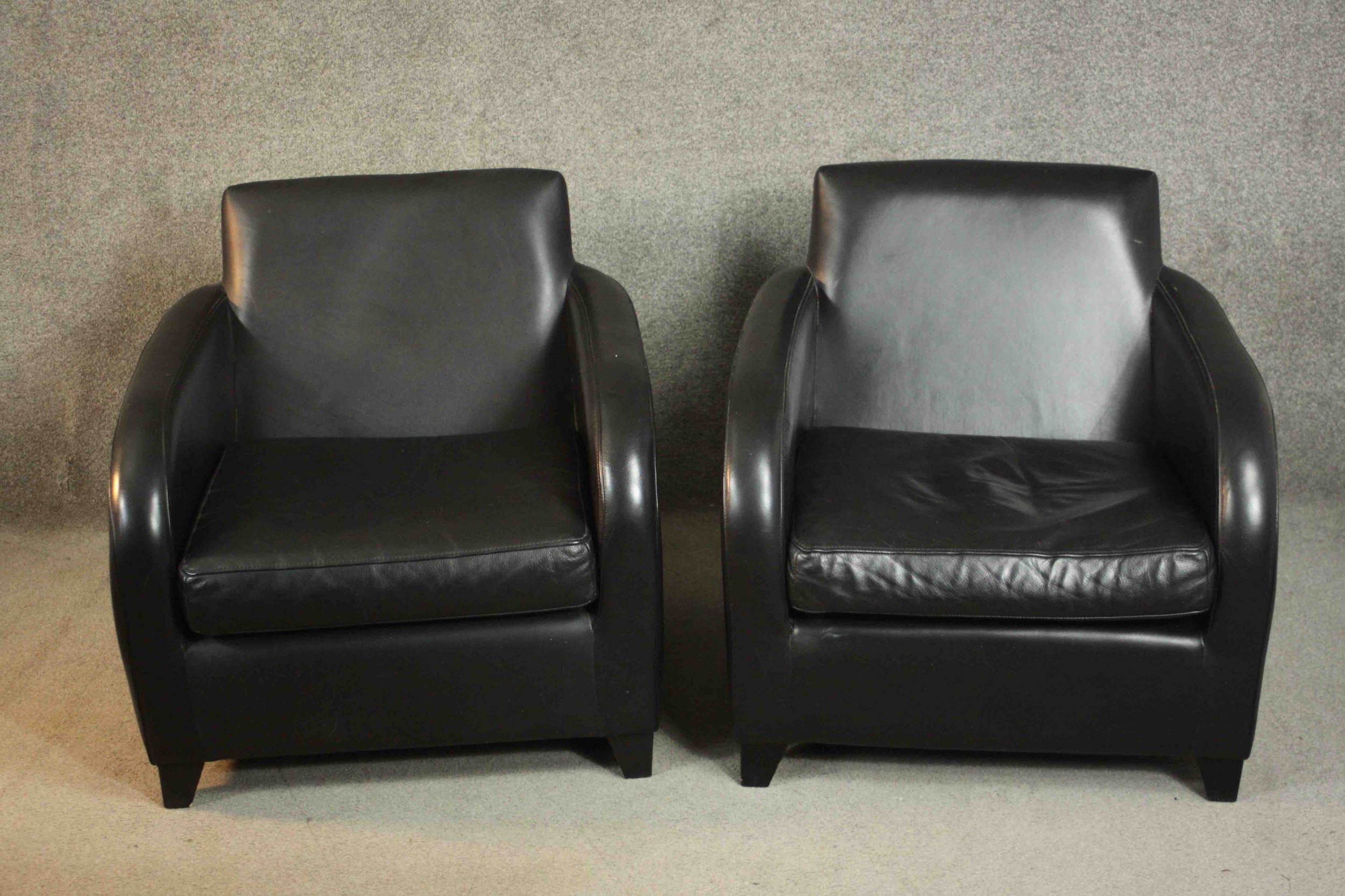 A pair of contemporary black leather armchairs, on tapering block feet, together with a matching - Image 4 of 10