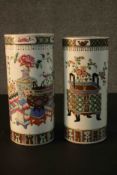 Two early 20th century Chinese Famille Rose cylindrical ceramic umbrella stands. One with a precious