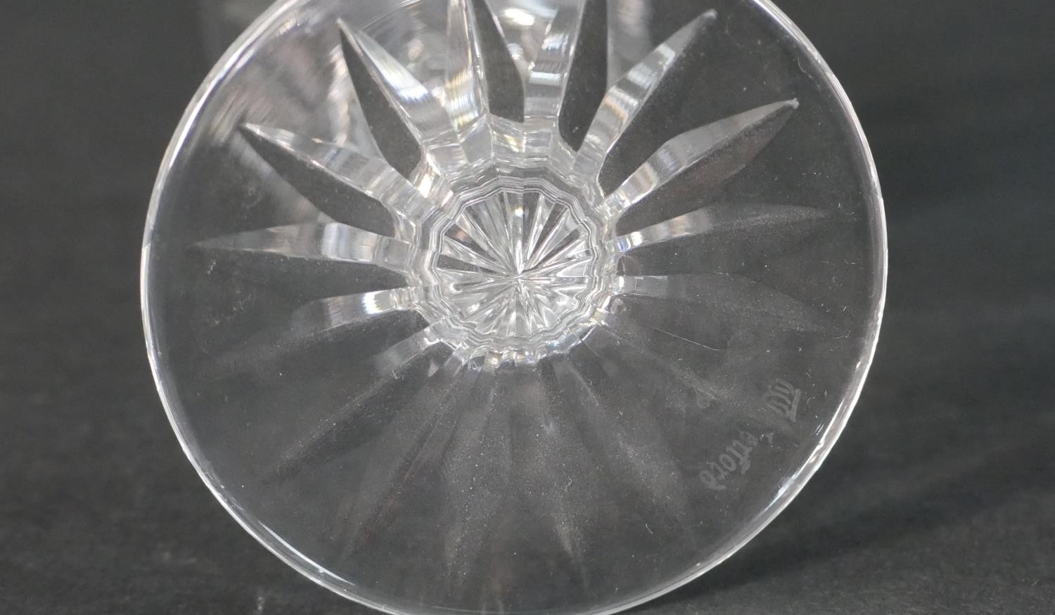 A collection of seven hand cut Waterford crystal wine and sherry glasses with star cut bases. - Image 6 of 6