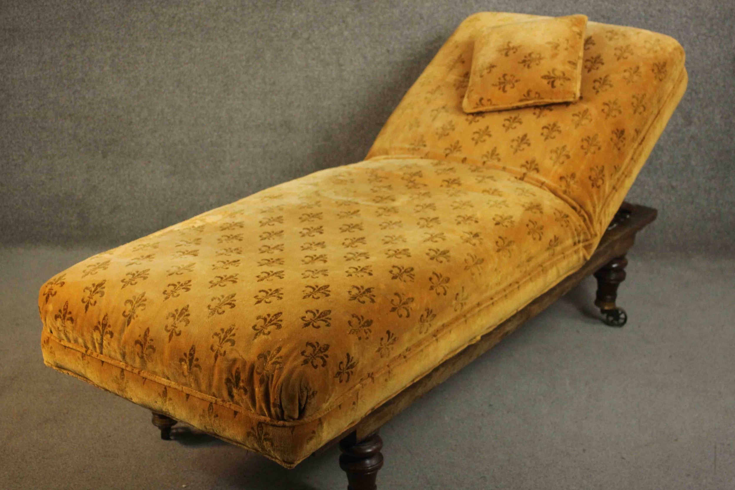 A Victorian daybed or doctor's examining bed, upholstered in a patterned mustard fabric with a loose - Image 8 of 11