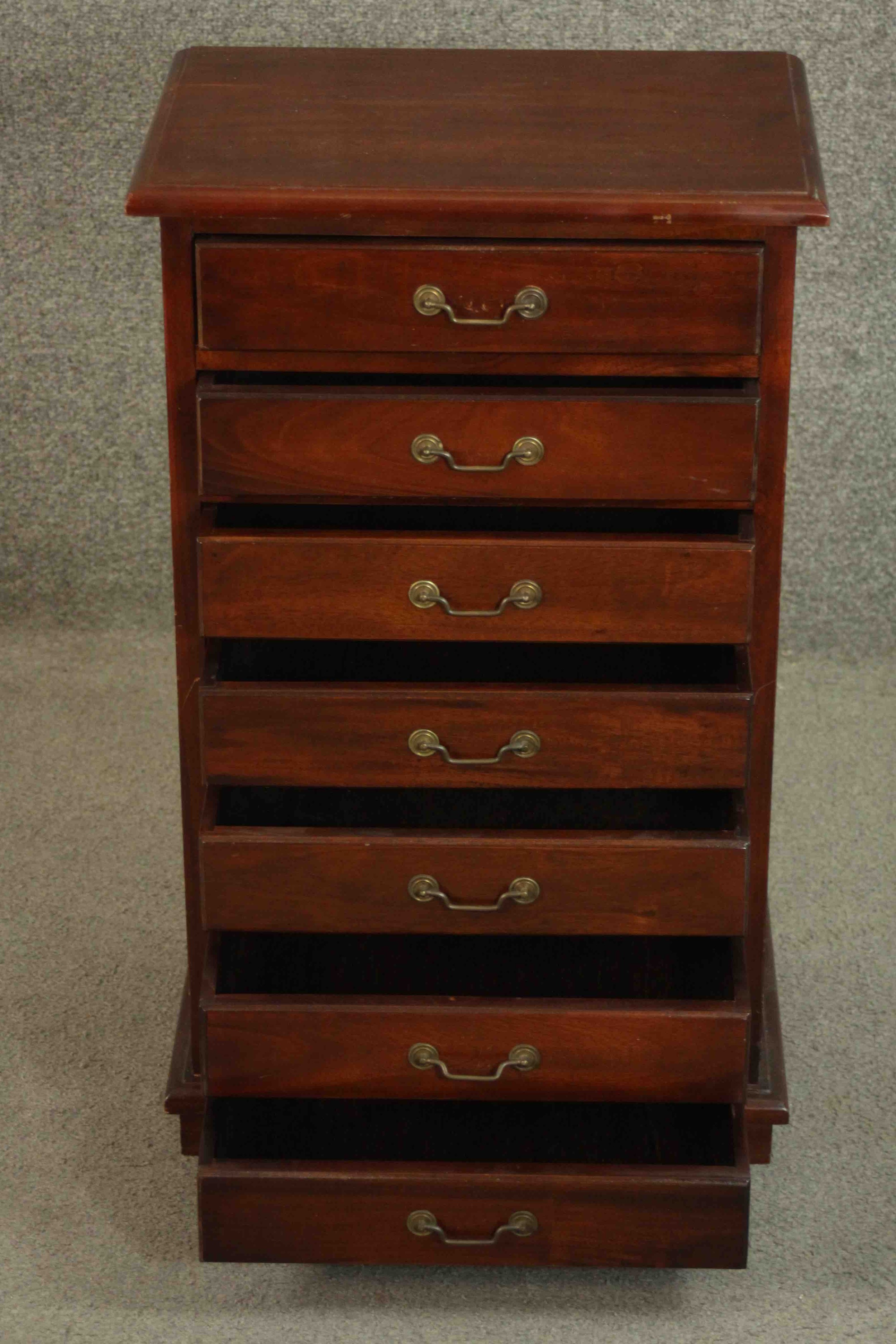 An Eastern hardwood specimen cabinet of seven drawers on block feet. H.72 W.44 D.31cm. - Image 3 of 8