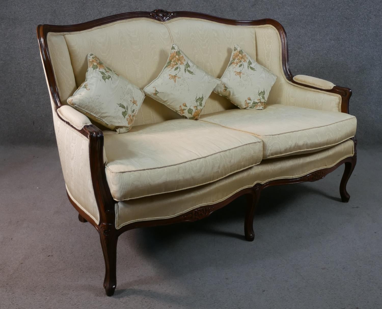 A late 20th century French show wood two seater sofa, with a carved frame, upholstered in cream - Image 2 of 7