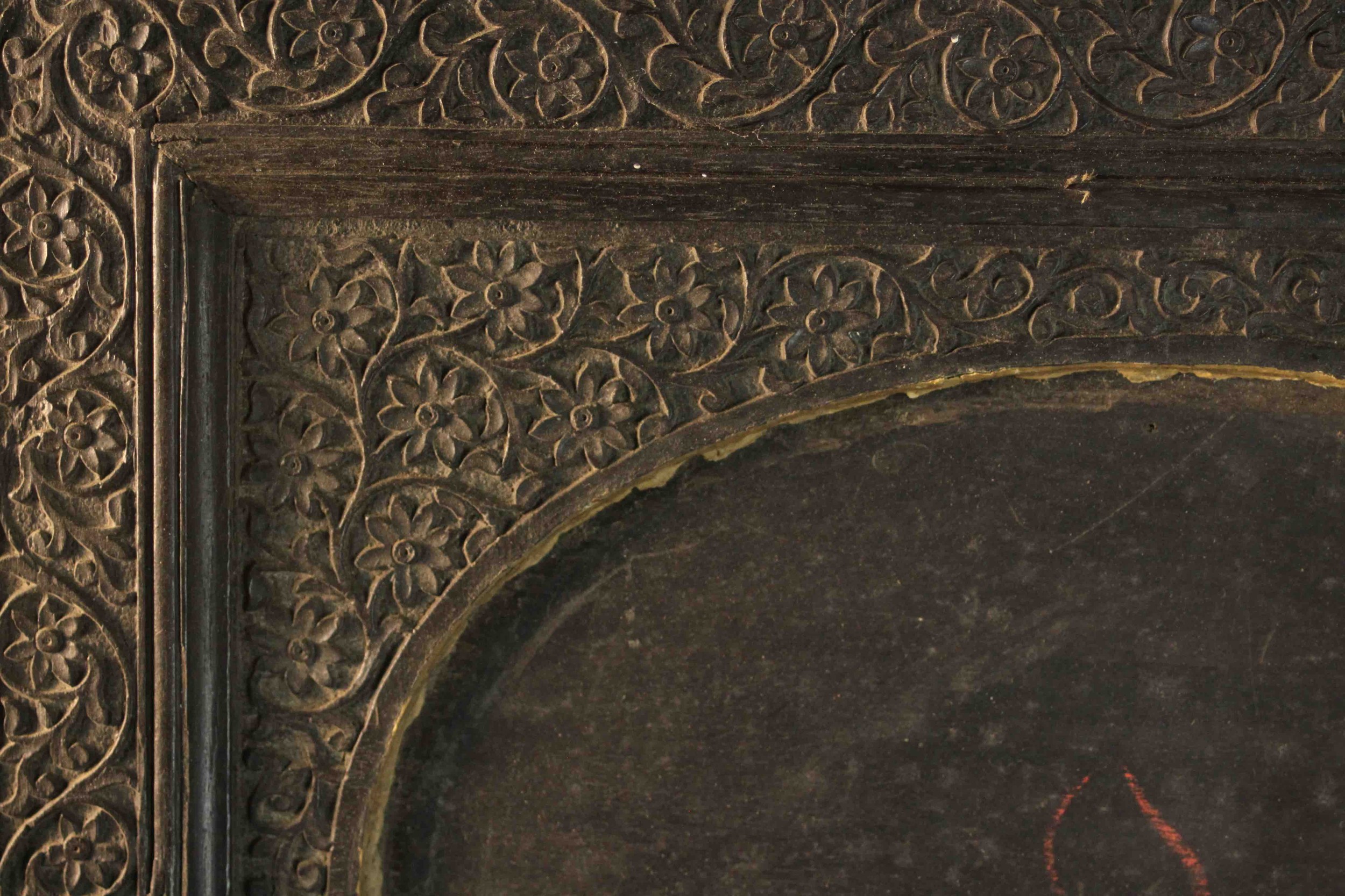 An Anglo-Indian ebonised carved easel picture frame with floral design and oval cartouche to centre. - Image 6 of 8