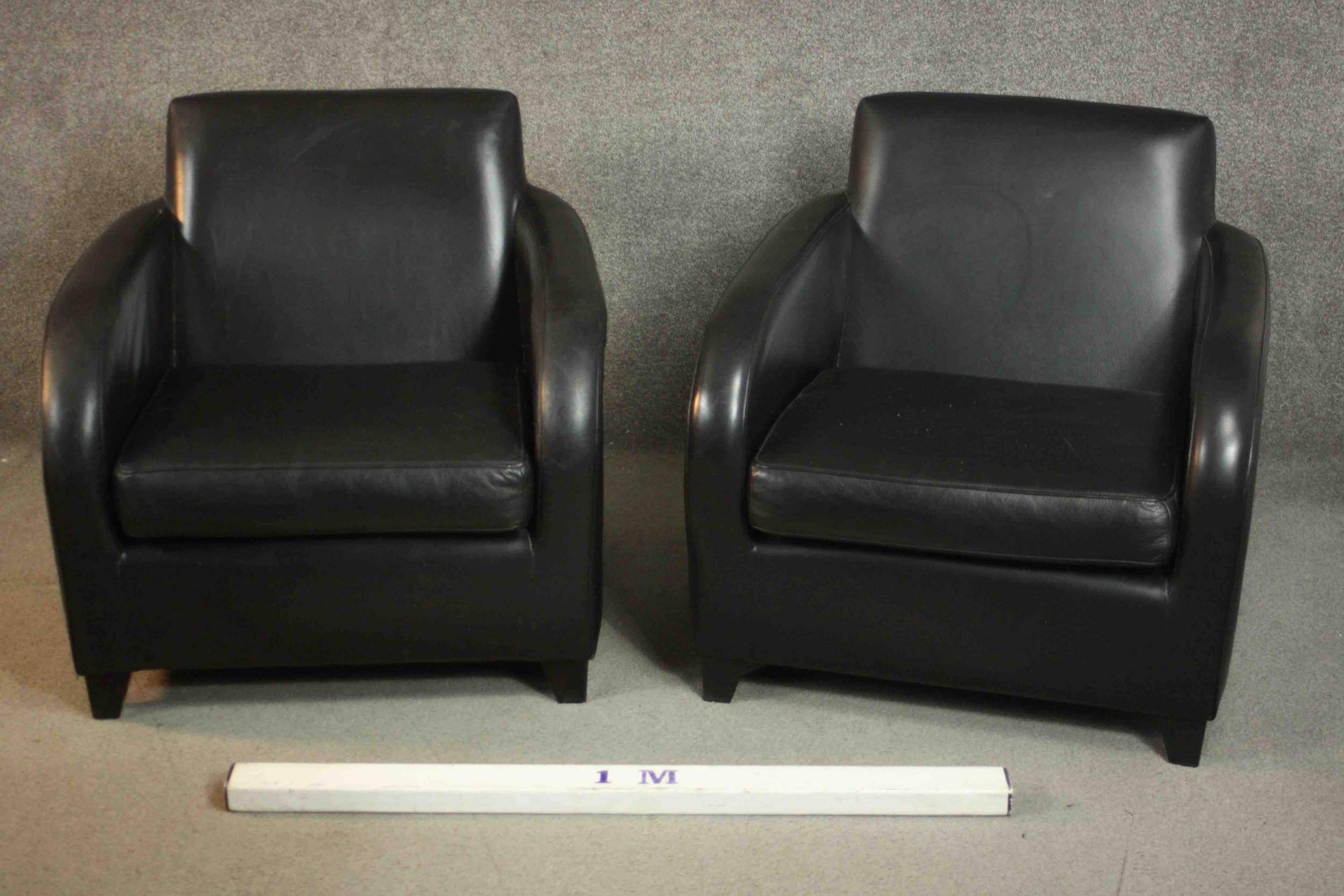 A pair of contemporary black leather armchairs, on tapering block feet. - Image 2 of 8