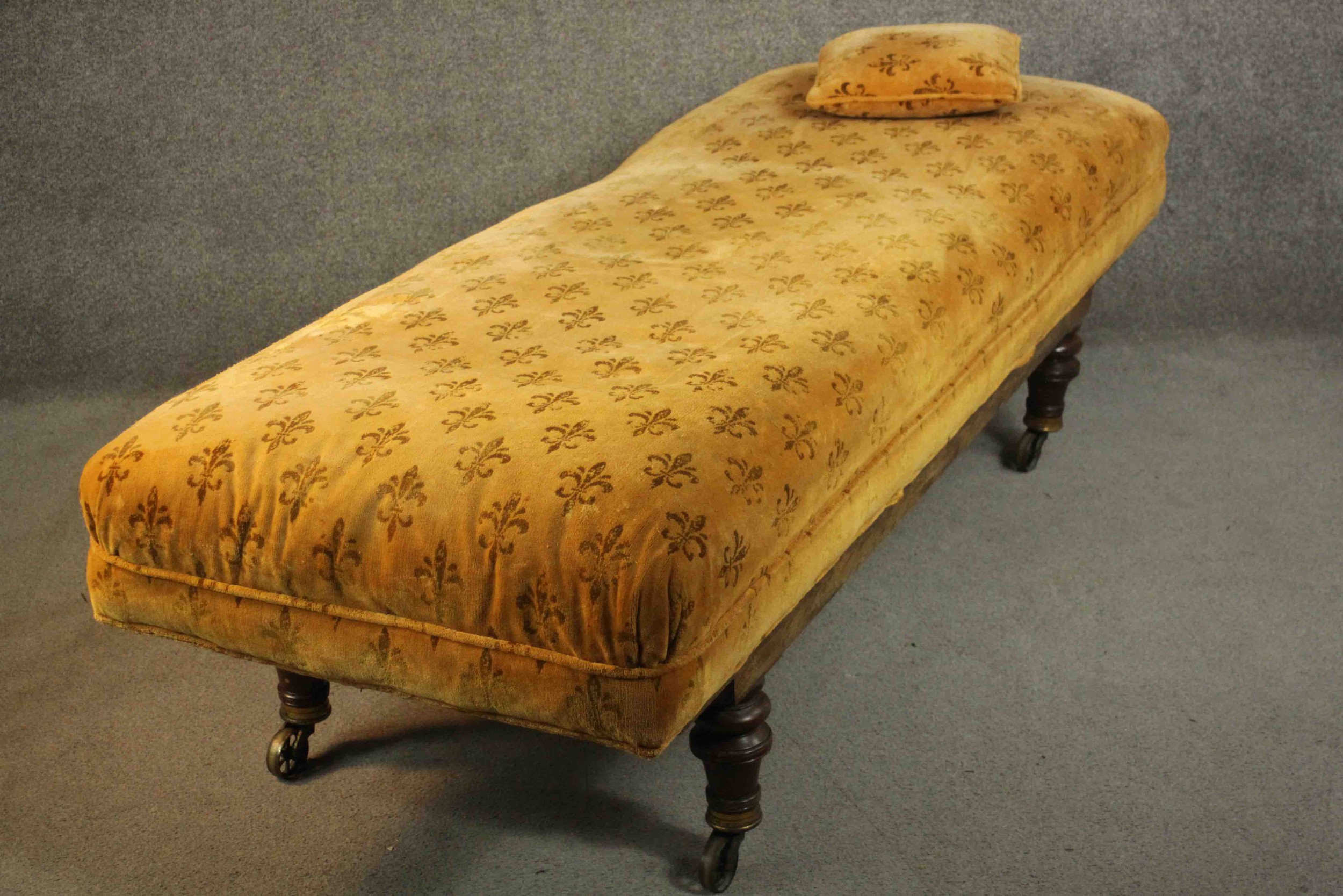 A Victorian daybed or doctor's examining bed, upholstered in a patterned mustard fabric with a loose - Image 6 of 11