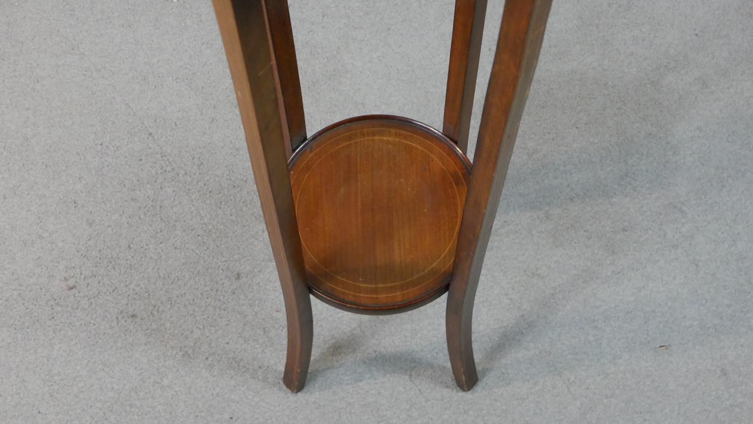 An Edwardian walnut jardiniere stand, with a circular line inlaid top over a circular undertier with - Image 5 of 5