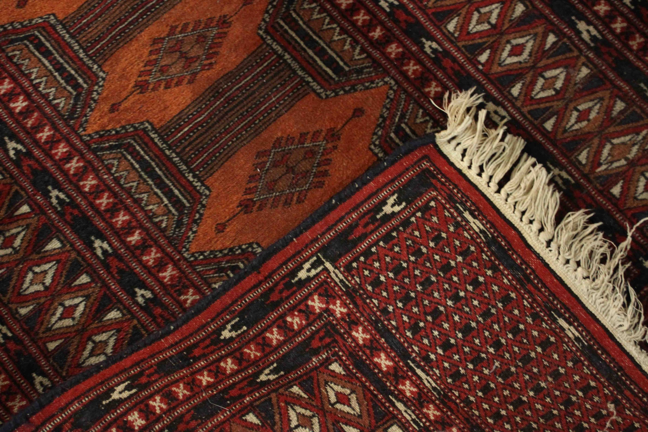 A Pakistan Bokhara rug with repeating pole medallions within multiple borders. L.126 W.80cm. - Image 5 of 5