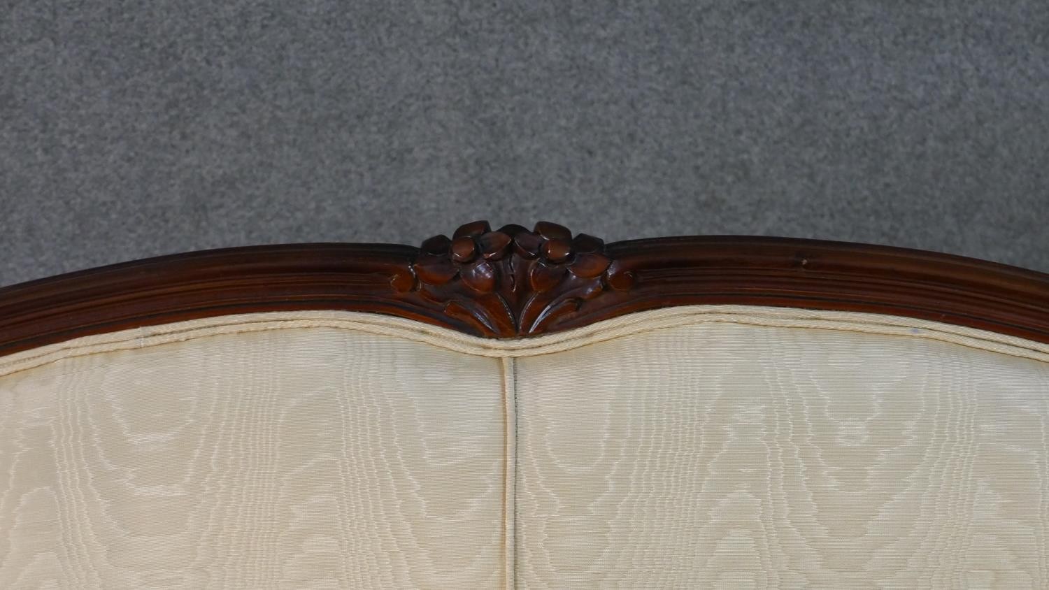 A late 20th century French show wood two seater sofa, with a carved frame, upholstered in cream - Image 5 of 7