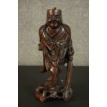 An early 20th century Chinese root wood carving of an immortal in traditional robes. (top of head