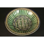 An early 20th century large Qajar green and blue geometric design ceramic bowl. H.10 Dia.36cm.