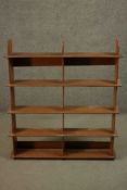 A set of late 19th century walnut hanging shelves. H.104 W.91 D.17cm.