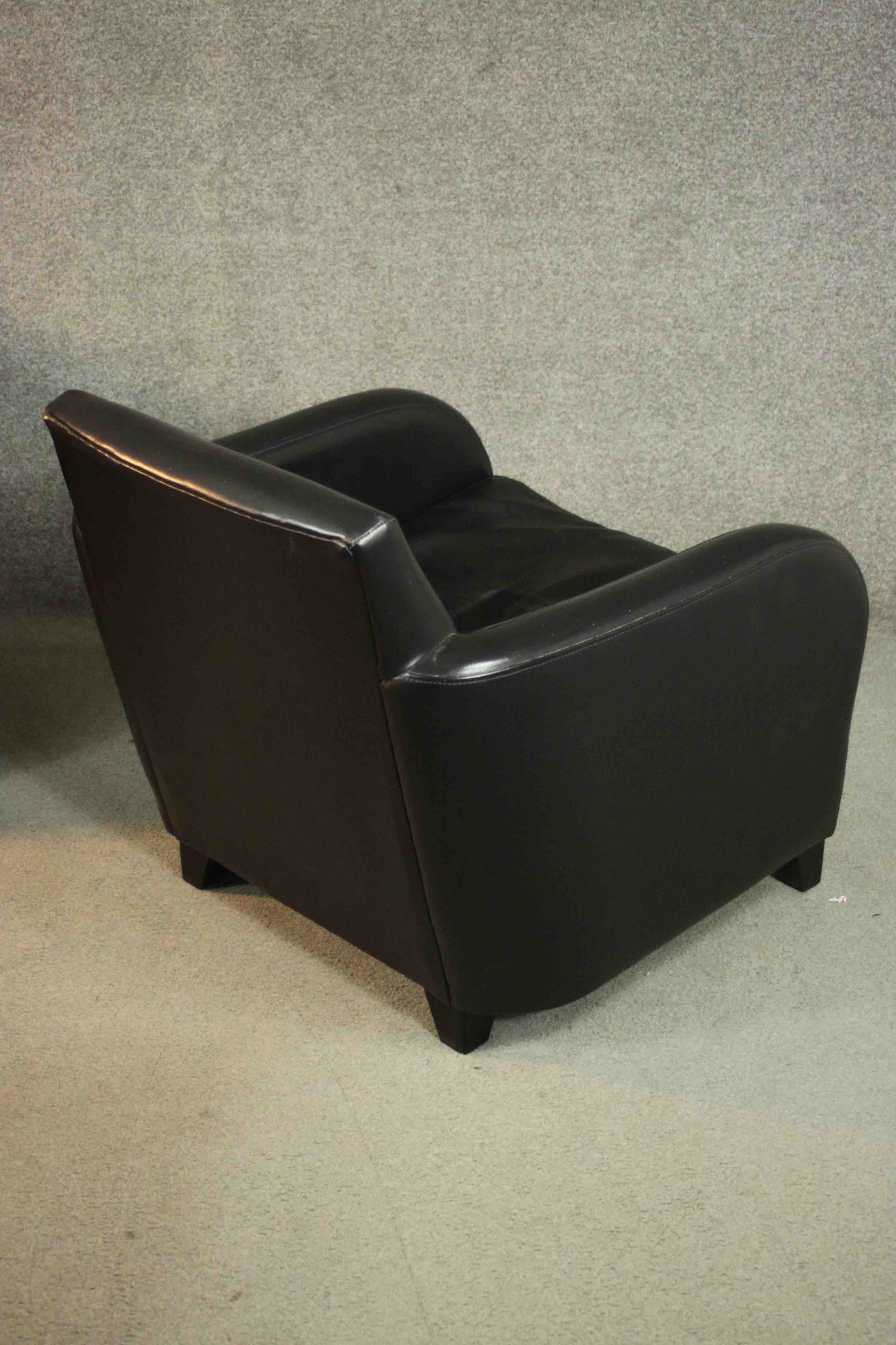 A pair of contemporary black leather armchairs, on tapering block feet, together with a matching - Image 7 of 10