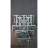 A set of six white painted Chippendale style dining chairs with drop in seats on square supports.