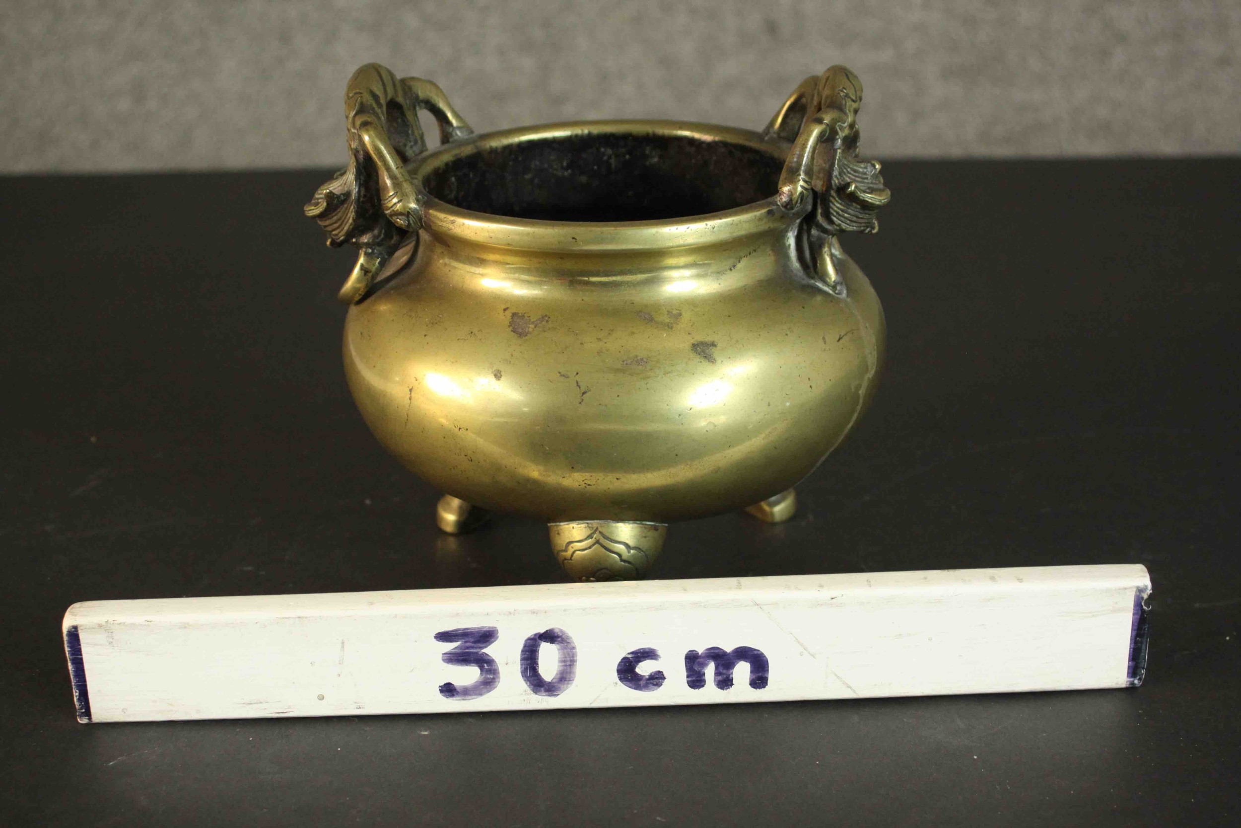 A three footed Chinese brass censer with dragon form handles. Apocryphal Ming Chenghua mark to base. - Image 2 of 6