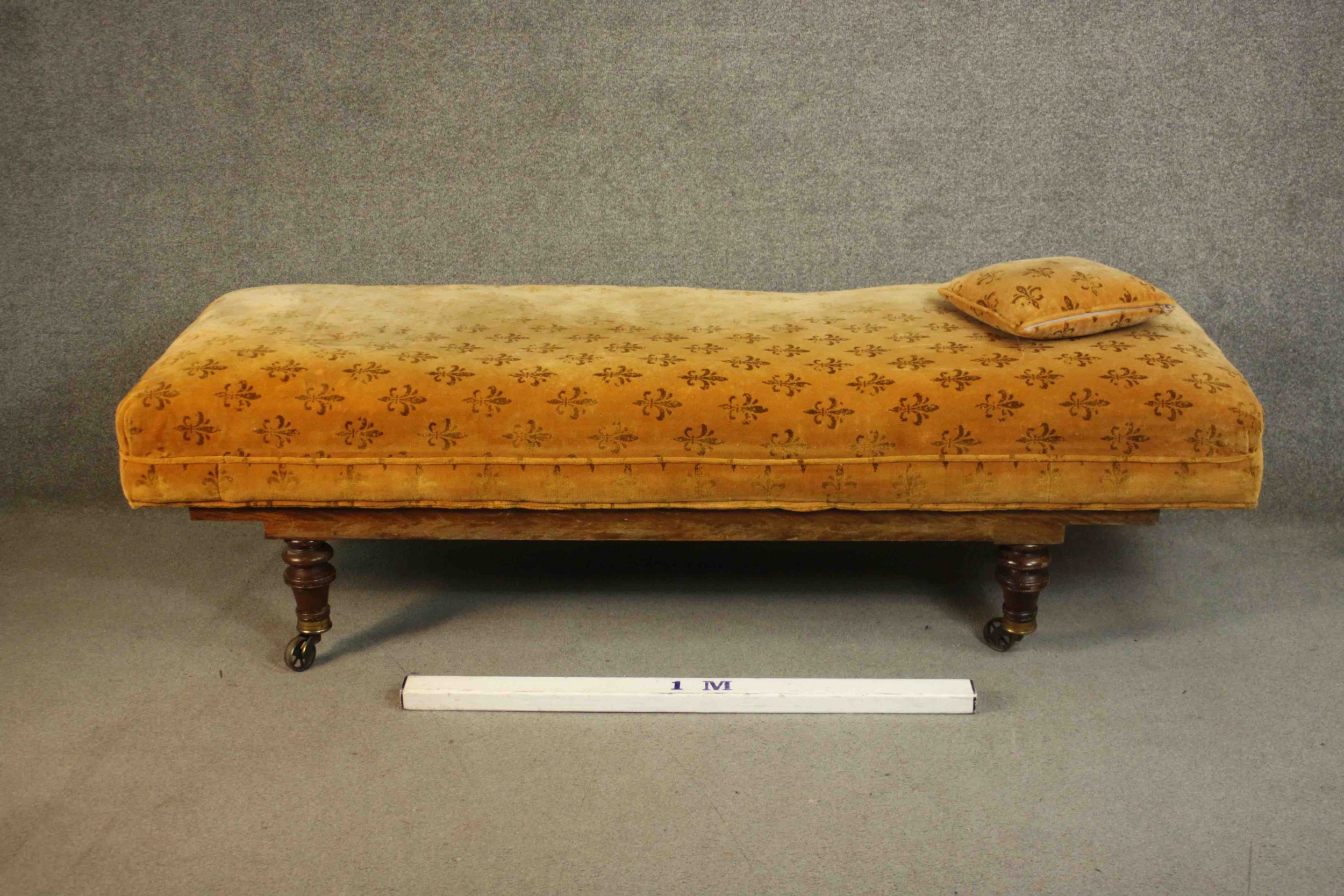 A Victorian daybed or doctor's examining bed, upholstered in a patterned mustard fabric with a loose - Image 2 of 11