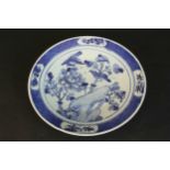A large 19th century Chinese blue and white hand painted porcelain plate depicting two song birds