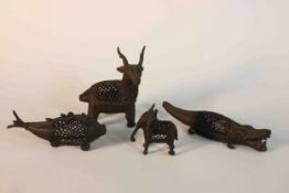 Four early 20th century Indian Dokra bronze pierced design animals. L.13 (largest)