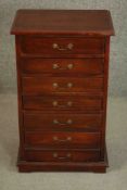 An Eastern hardwood specimen cabinet of seven drawers on block feet. H.72 W.44 D.31cm.