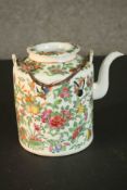 A 19th century Chinese Famille Rose hand painted porcelain tea pot decorated with flowers,