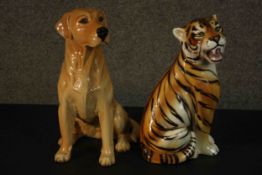 Two large hand decorated ceramic animals, a seated tiger and a golden Labrador. Impressed makers