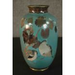 A Meji period Japanese cloisonne enamel baluster vase decorated with a pair of quail under a