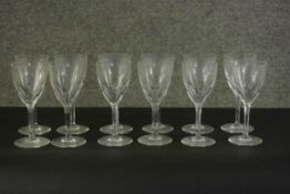 A set of twelve Baccarat crystal wine glasses, maker's stamp to the base. H.16 Dia.7cm.