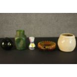 A collection of ceramics and glass, including a green glass fishing float and green lustre