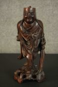 An early 20th century Chinese root wood carving of an immortal in traditional robes. (top of head