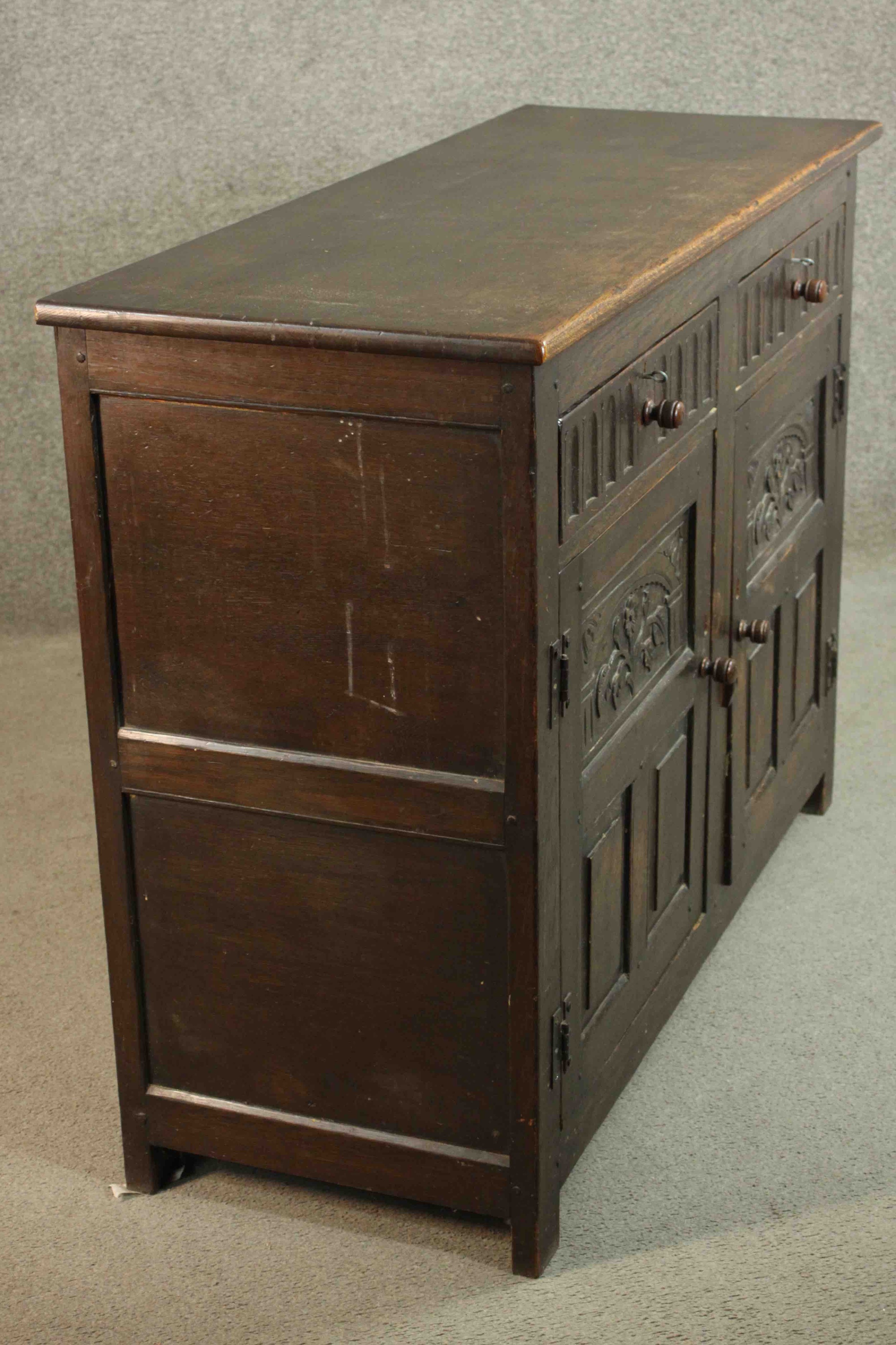 A country antique oak style sideboard fitted with carved drawers and drawers on block supports. H.91 - Image 9 of 11