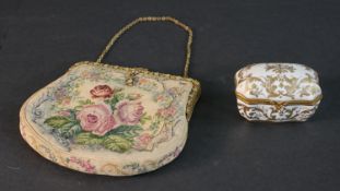 A hand painted and gilded scrolling foliate design porcelain trinket box, signed to base along