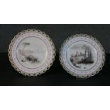 Two 19th century hand painted en grisaille landscape design porcelain plates, each with a pierced