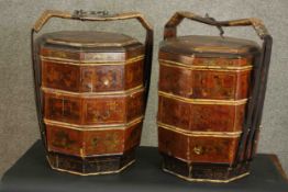 A pair of 19th century hand painted and lacquered Chinese three section marriage chests with woven