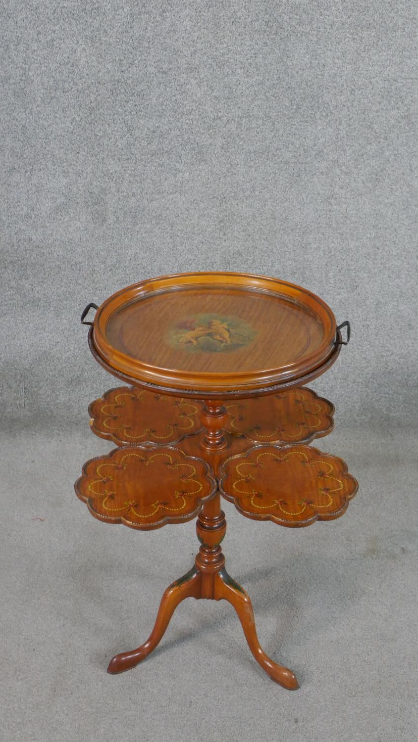 An unusual C.1900 Sheraton style satinwood supper table or etagere, the circular top painted with