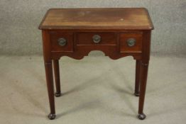 A late 19th century George III style mahogany lowboy, the rectangular top with a moulded edge and