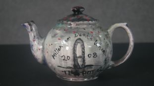 STOT21stCplanB (Harry Adams), 20th Century, Millennium Death Wheel teapot, glazed and hand painted