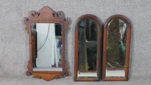 Three mahogany framed 19th century wall mirrors, including a pair of arched wall mirrors. H.67 W.