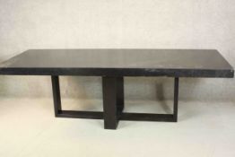 A contemporary black or ebonised ash dining table, of rectangular form. H.77 W.250 D.100cm.