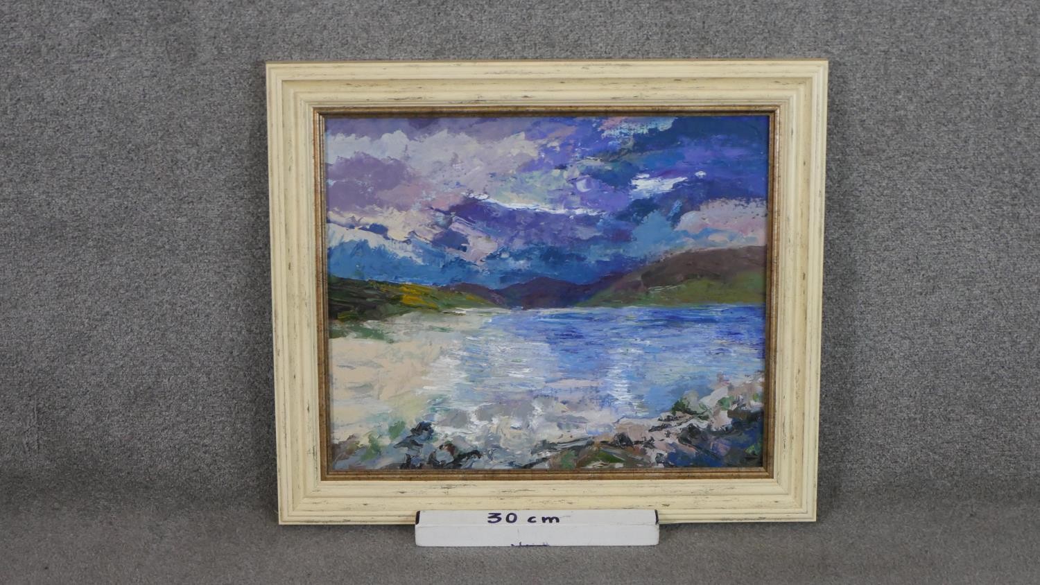 A framed oil on canvas of a mountain lake scene, unsigned. H.58 W.69cm - Image 3 of 4